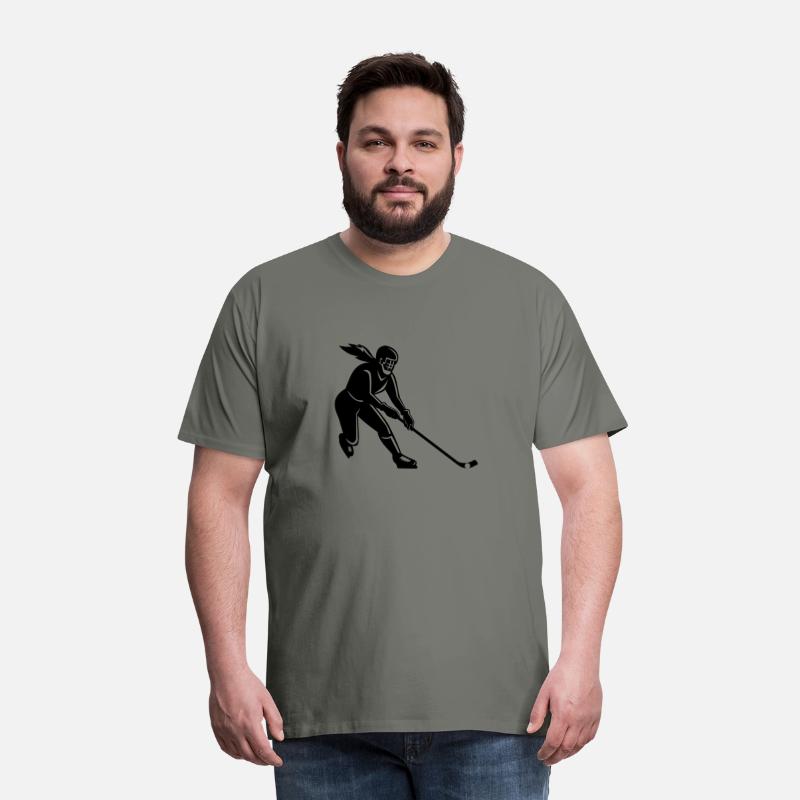 Female Bandy Player Striking Ball with Stick